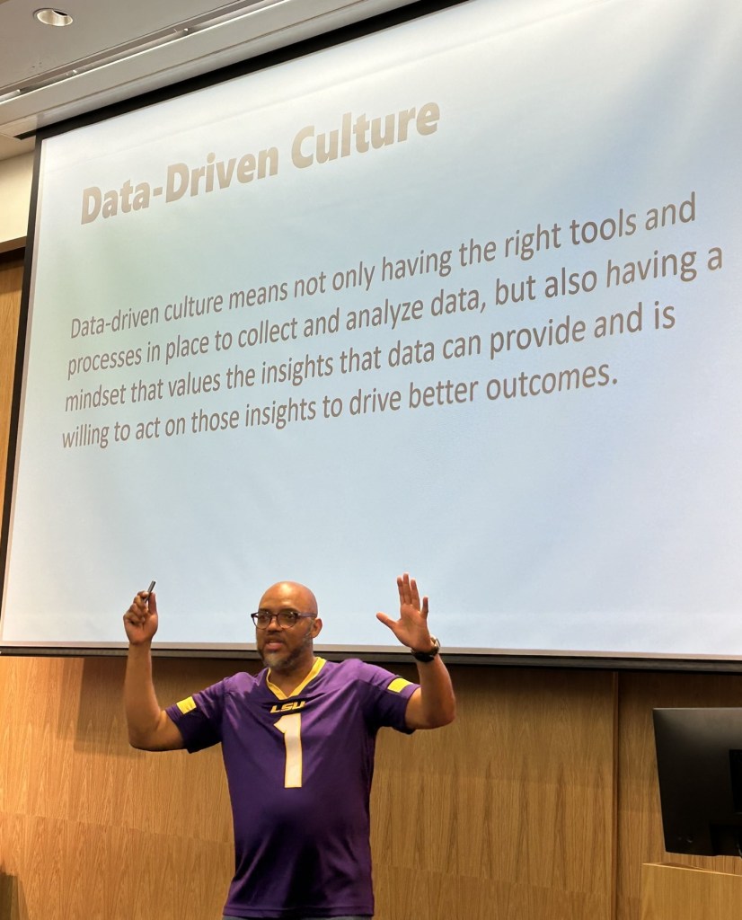 Patrick Leblanc standing in front of slide that says Data-Driven Culture
